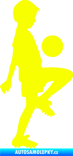 Samolepka Děti silueta 005 pravá kluk fotbalista Fluorescentní žlutá