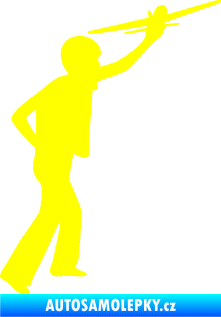 Samolepka Děti silueta 003 pravá kluk s modelem letadla žlutá citron