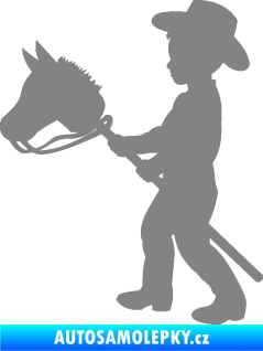 Samolepka Děti silueta 012 levá kluk s dřevěným koníkem šedá