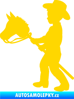 Samolepka Děti silueta 012 levá kluk s dřevěným koníkem jasně žlutá