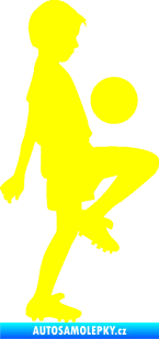 Samolepka Děti silueta 005 pravá kluk fotbalista žlutá citron