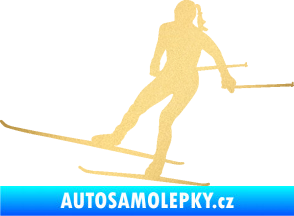 Samolepka Lyžařka 001 levá běh na lyžích zlatá metalíza