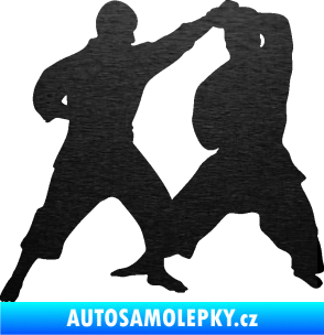 Samolepka Karate 013 levá souboj škrábaný kov černý
