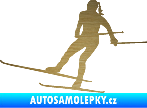 Samolepka Lyžařka 001 levá běh na lyžích škrábaný kov zlatý